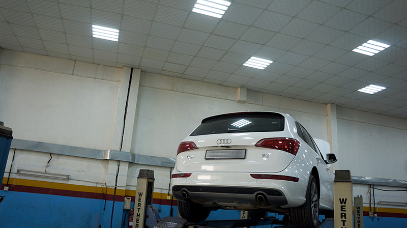 Audi Q5 on a workshop lift, rear view