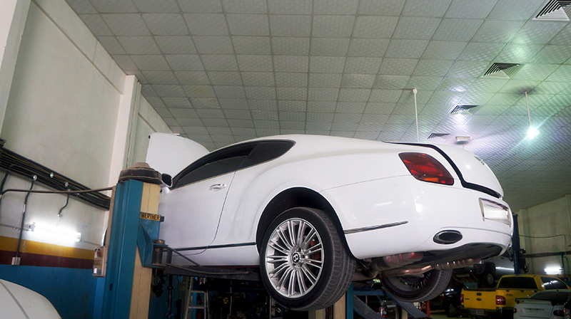 Bentley Continental on a workshop lift