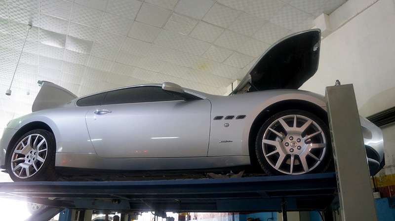 Maserati GranTurismo on a workshop lift